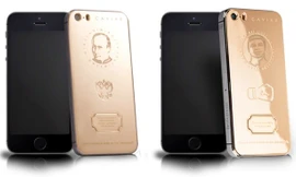 Điện thoại mạ vàng khắc hình Tổng thống Nga Vladimir Putin và hình cựu võ sĩ quyền Anh Muhammad Ali.(Nguồn: Mobinet) 