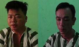 Hai đối tượng Nguyễn Anh Tuấn (phải) và Huỳnh Văn Vinh tại cơ quan điều tra. Ảnh CA cung cấp.