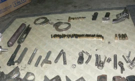 Một số chi tiết cơ khí thu giữ trong nhà Huy