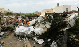 Hiện trường vụ máy bay Đài Loan gặp nạn. Ảnh: US News 