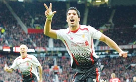 Luis Suarez mang lại ác mộng cho Manchester United ngay tại Nhà hát của những giấc mơ. Ảnh: Sport Images