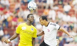 Đồng Nai (trắng) thắng đậm Quảng Nam nhờ lợi thế hơn người. Ảnh: A.Tài