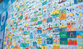 Bức tường cam kết được tạo thành từ 1.000 bức tranh do mẹ và bé sáng tạo nhằm thể hiện sự cam kết trong việc phối hợp hai yếu tố dinh dưỡng tối ưu và vận động thường xuyên để trẻ có thể phát triển khỏe mạnh