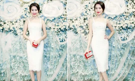 Thu Thảo khoe vai trần quyến rũ với váy ren trắng