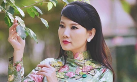 NSƯT Mỹ Uyên mặc áo dài rực rỡ ghi hình Tết