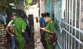 Công an khám nghiệm hiện trường nơi xảy ra án mạng