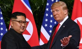 Chủ tịch Triều Tiên Kim Jong-un và Tổng thống Mỹ Donald Trump trước cuộc gặp thượng đỉnh tại Singapore. (Ảnh: Getty Images)