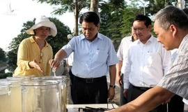 Bị can Nguyễn Đức Chung (giữa)