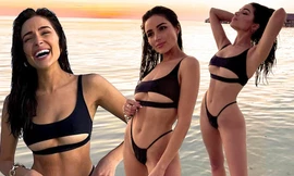 Hoa hậu Olivia Culpo mặc bikini cắt xẻ phô chân ngực 'bỏng mắt'