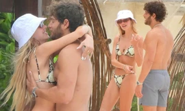 Nàng mẫu Delilah Hamlin khoe dáng với bikini, liên tục ôm ấp bạn trai