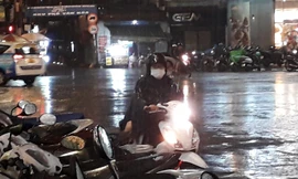 TPHCM bất ngờ mưa xối xả tối mùng 3 Tết 