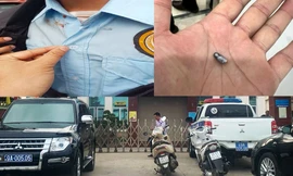 Bị vây bắt, kẻ cướp ngân hàng nổ súng bắn sượt qua ngực bảo vệ 