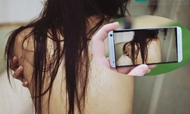 Cắt ghép hình vào clip 'nóng' để tống tiền hơn 2 tỷ đồng