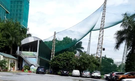 Giải tỏa bãi xe “mọc” trái phép trên đất quy hoạch trồng cây xanh