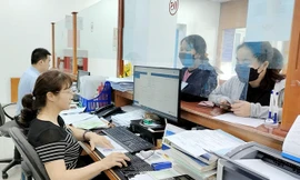 Yên Bái dừng in thẻ BHYT giấy đối với người tham gia BHXH bắt buộc