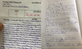 Chữ viết “đổ rạp” của nam sinh đố ai đọc được, cô giáo cho điểm cũng phải “hoa mắt“