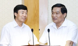 Ông Nguyễn Doãn Khánh (trái) và ông Hà Ngọc Chiến (phải)