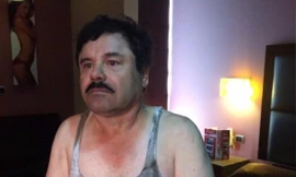 Bức ảnh được chụp khi trùm ma tuý bị bắt. Ảnh: CNN 