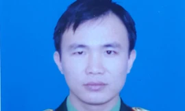 Di ảnh Đại úy Cao Xuân Tú.