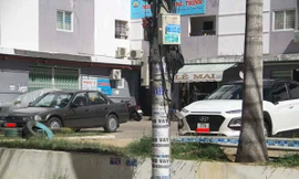 Ô tô đậu, đỗ trước khuôn viên chung cư thu nhập thấp Long Thịnh. Ảnh: Tr.Định