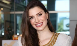 Hình ảnh Hoa hậu đẹp nhất thế giới ở sân bay Tân Sơn Nhất