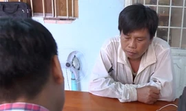 Nguyễn Tấn Phát trong một lần làm việc với cơ quan công an.