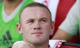 Wayne Rooney trên đường trở lại nước Anh.