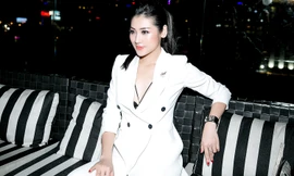 Á hậu Tú Anh mặc 'cây' vest trắng muốt, khoe vòng một gợi cảm