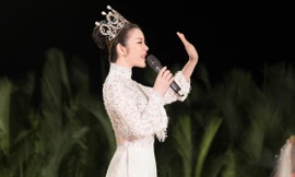 Áo dài của Lý Nhã Kỳ đấu giá được 500 triệu đồng trong show thời trang