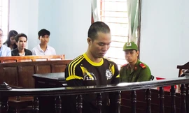 Bị cáo Nguyên trước vành móng ngựa (Ảnh: Kim Hà).