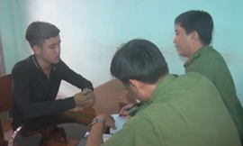 Hồ Minh Khánh tại cơ quan công an.