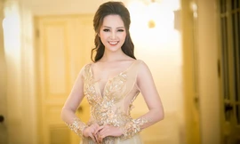 Á hậu Thuỵ Vân mặc váy dạ hội làm MC đêm nhạc Phú Quang