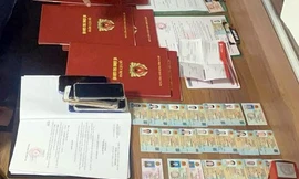 Phá ổ nhóm làm giả thẻ ngành công an, quân đội để lừa tiền ngân hàng