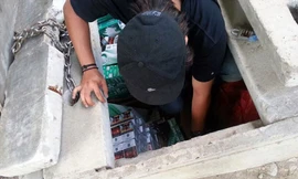 Mảng tối ở phố đèn đỏ Singapore