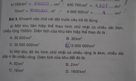 Hai bài toán cùng sai đáp án trong một trang sách. Ảnh: Viết Tuân.