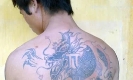 Hình xăm gớm ghiếc của Nhị "Máy chém".