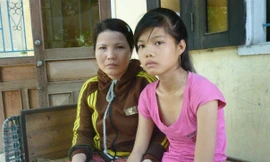 Chị Sương cùng con gái. 