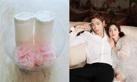 Vợ chồng Bi Rain đón con đầu lòng.