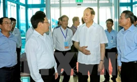 Chủ tịch nước Trần Đại Quang kiểm tra công tác an ninh tại sân bay quốc tế Đà Nẵng. Ảnh: TTXVN.