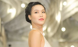 Thùy Dung khoe lưng trần dự tiệc