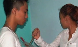 Ánh thực nghiệm lại việc gây án. Ảnh: Công an TP HCM