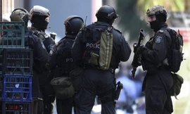 [ẢNH] Lính bắn tỉa bao vây kẻ bắt cóc con tin ở Sydney