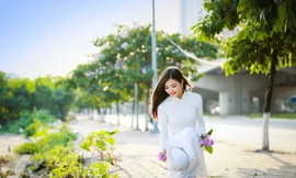 Thiếu nữ Hà thành đẹp dịu dàng bên hoa bằng lăng