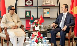 Chủ tịch nước Trần Đại Quang tiếp Chủ tịch đảng Công nhân Bangladesh Rashed Khan Menon. (Ảnh: Nhan Sáng/TTXVN)