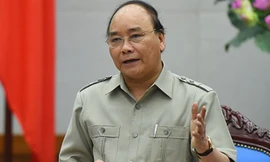 Thủ tướng Nguyễn Xuân Phúc chỉ đạo tập trung lực lượng, tìm bằng được phi công máy bay Su-30 MK2 mất tích là thượng tá Trần Quang Khải. Ảnh: VGP.