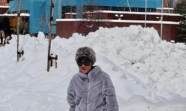 Thảo Vân xinh tươi, trẻ trung tạo dáng bên khung cảnh tuyết trắng xóa