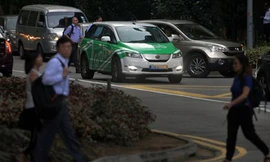 Chính quyền Singapore muốn những ứng dụng gọi xe phải chịu trách nhiệm lớn hơn về quy chuẩn dịch vụ và độ an toàn. Ảnh: Strait Times