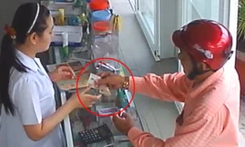 Người đàn ông biến tờ 100.000 đồng thành 10.000 đồng