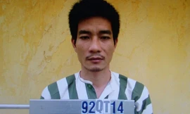 Nguyễn Mạnh Tuấn tại cơ quan công an.