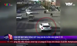 Bị cuốn vào gầm ô tô, bé trai may mắn sống sót